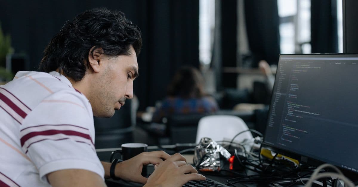 Software engineer solving a whiteboard problem in a big tech interview