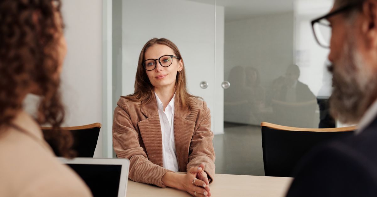 UPSC aspirant confidently answering questions before an interview board panel